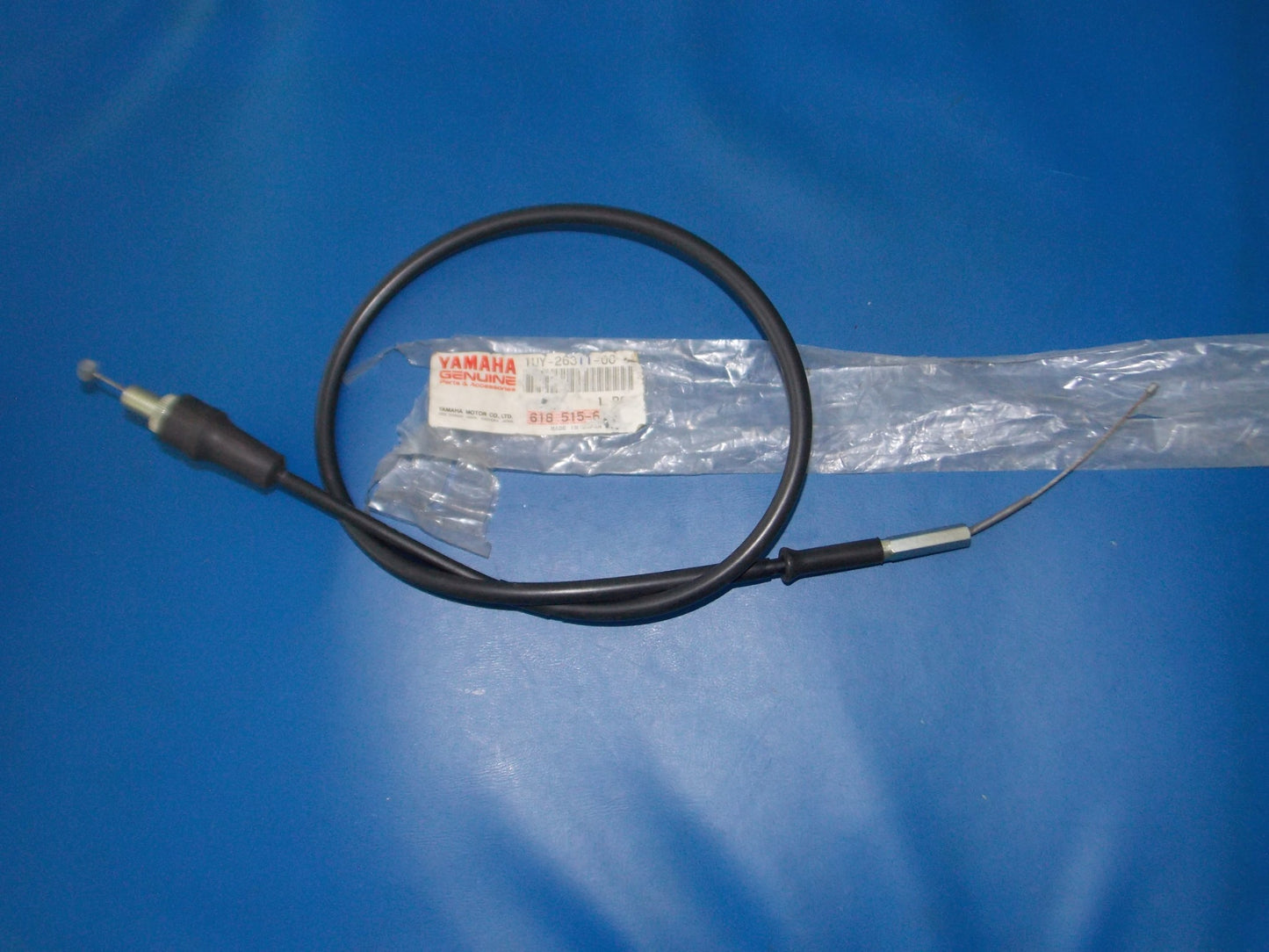 NOS YAMAHA 1987 YFM350 THROTTLE CABLE 1 1UY-26311-00 - MotoRaider