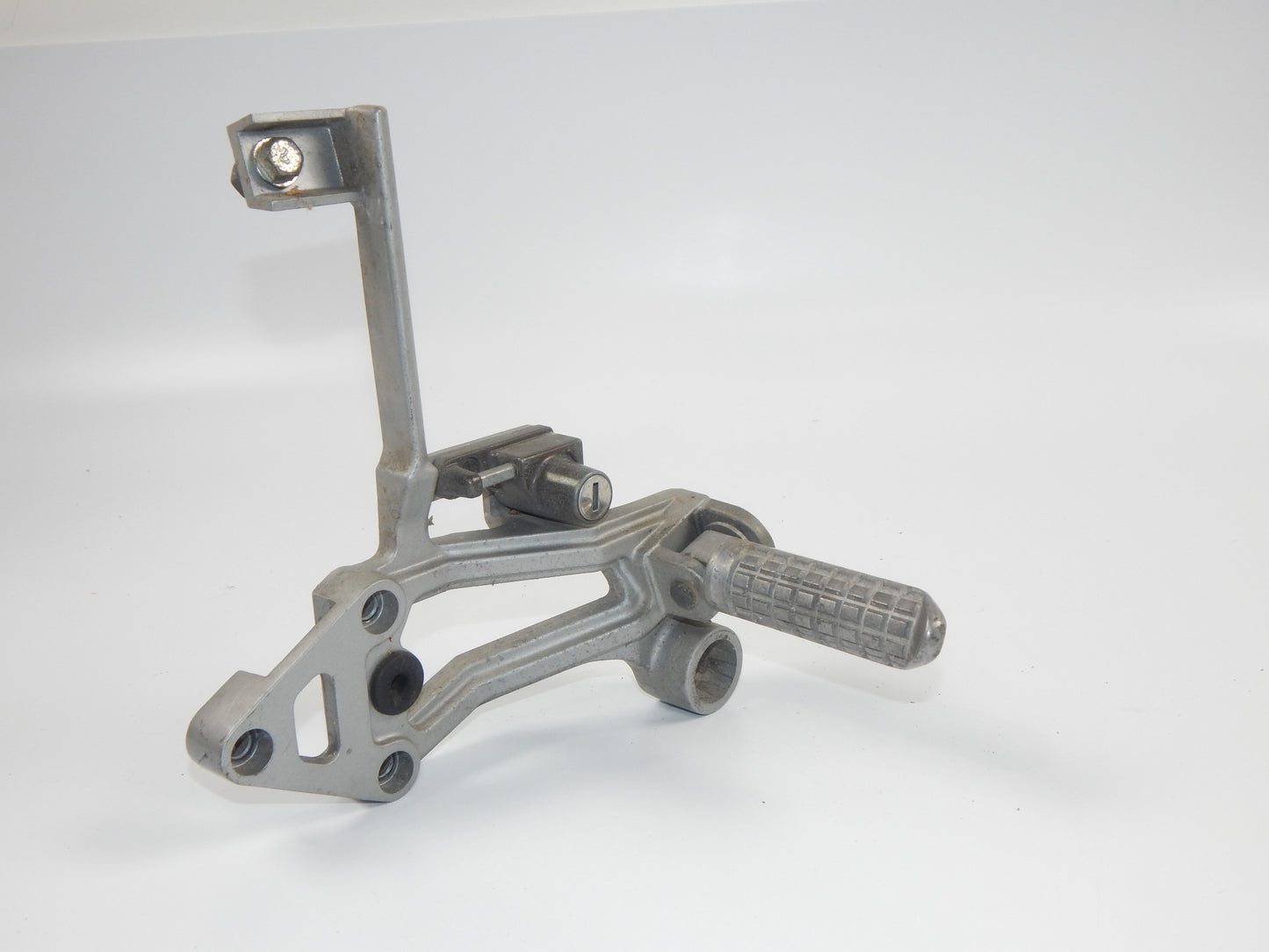 1986 KAWASAKI GPX 750-R REAR LEFT PASSENGER FOOT PEG STAY STAND BRACKET VINTAGE - MotoRaider