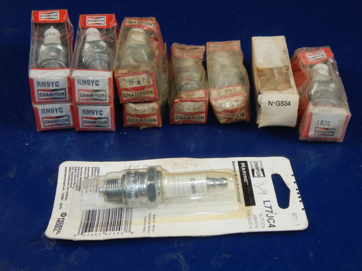 59 NEW MIXED SPARK PLUG MOTORCYCLE SCOOTER ATV NGK BOSCH CHAMPION ND DENSO - MotoRaider