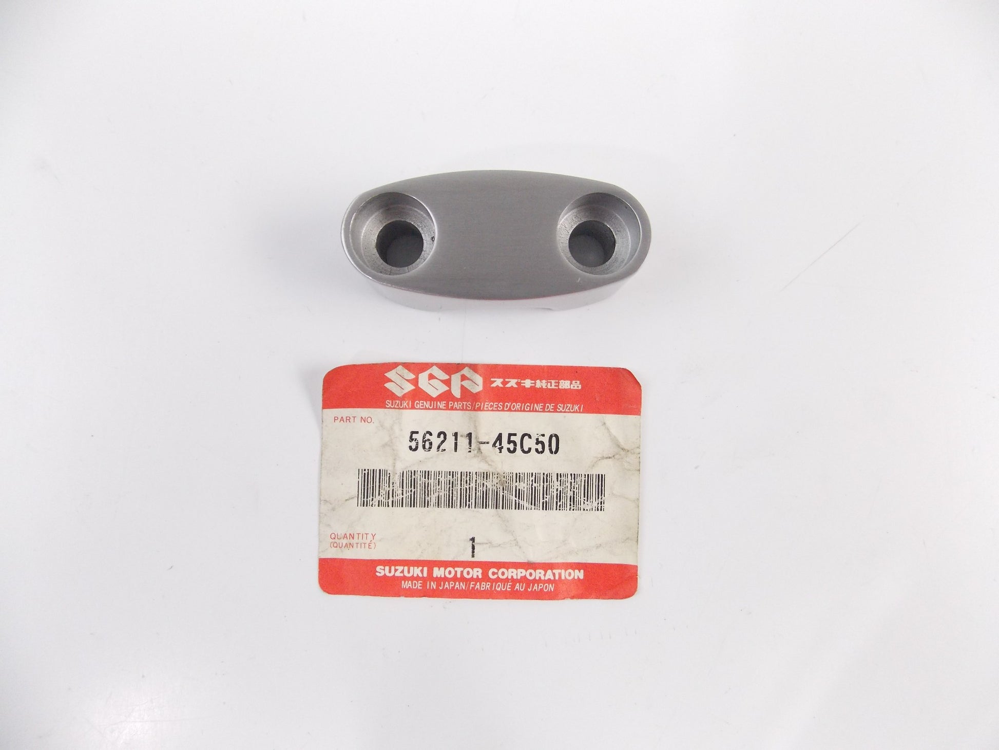 NOS OEM SUZUKI 1999-2002 SV650 HANDLEBAR UPPER CLAMP 56211-45C50 - MotoRaider