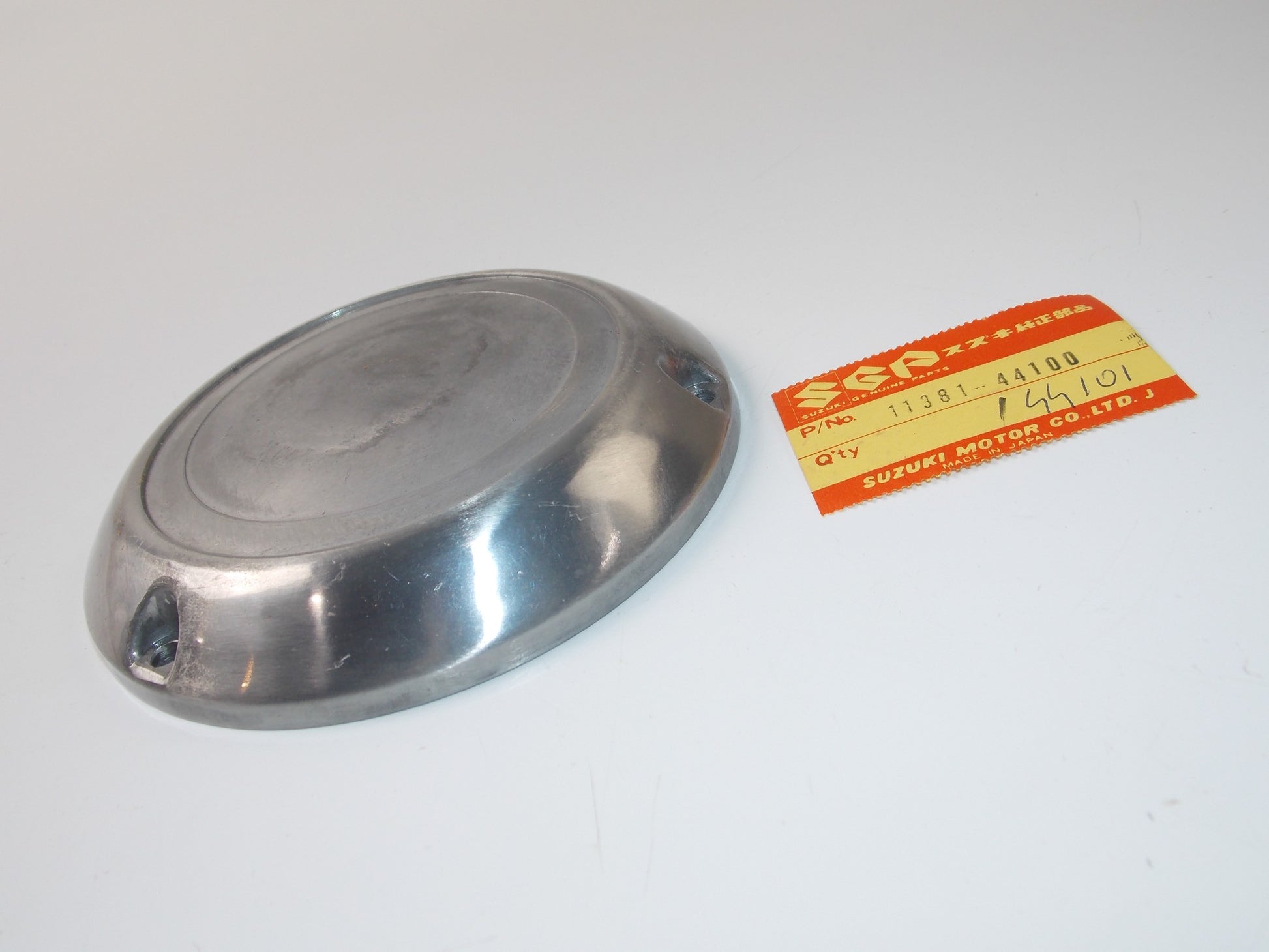 NOS OEM 1980 SUZUKI GS450 LEFT SIDE GENERATOR MOTOR COVER  11381-44100 - MotoRaider