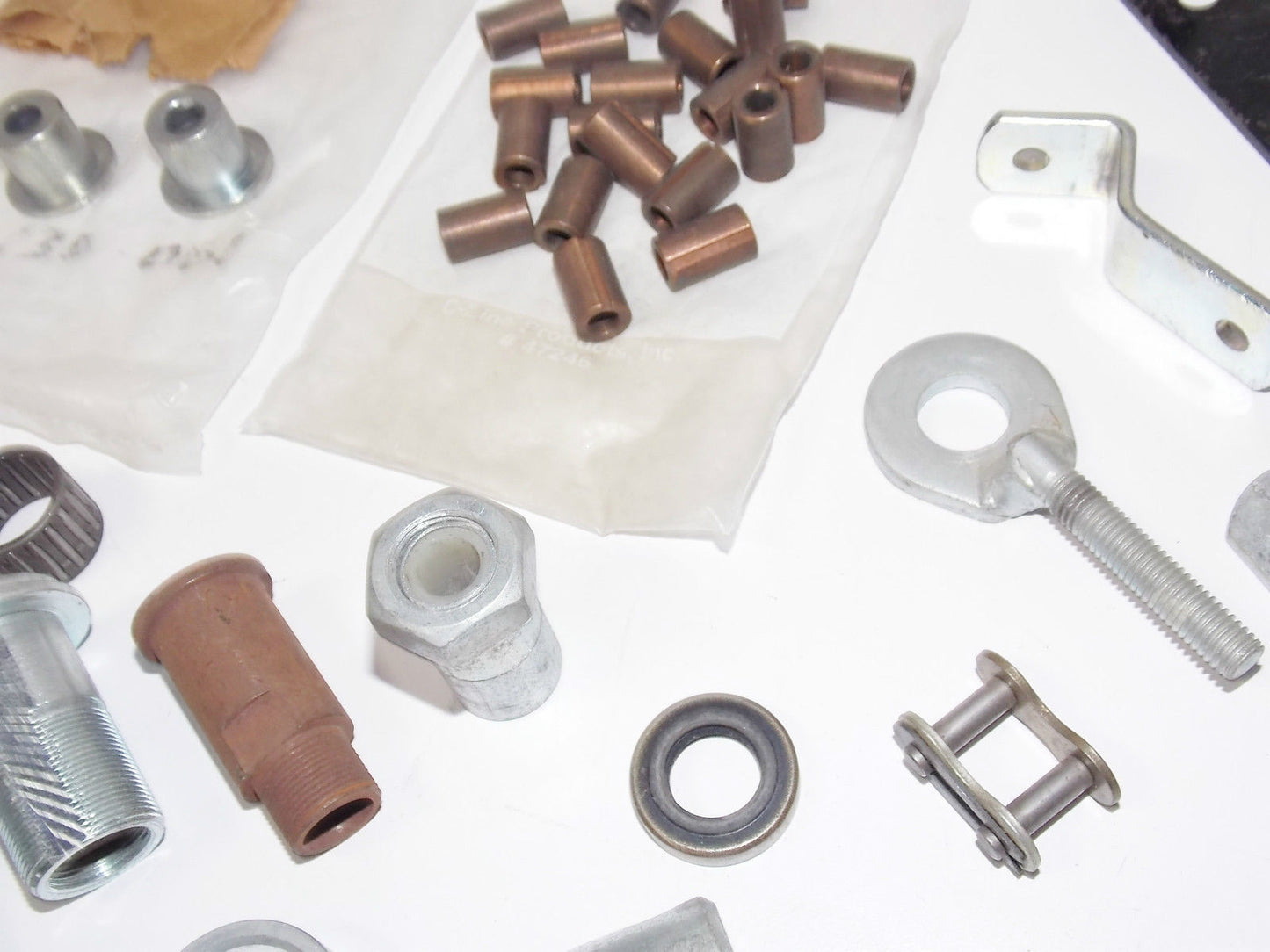 NOS Puch Allstate MIXED PARTS Spacer Bearing Nut Axle Adjustor Plate Mount Clip - MotoRaider