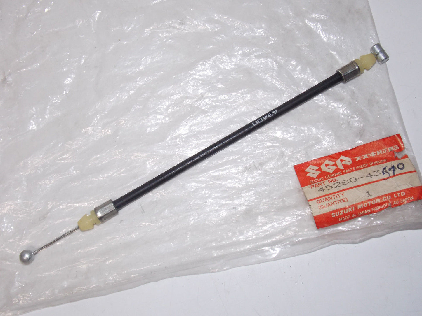 OEM NOS NEW SUZUKI 1985 1986 2004 2006 SEAT SADDLE LOCK CABLE 45280-43510 - MotoRaider