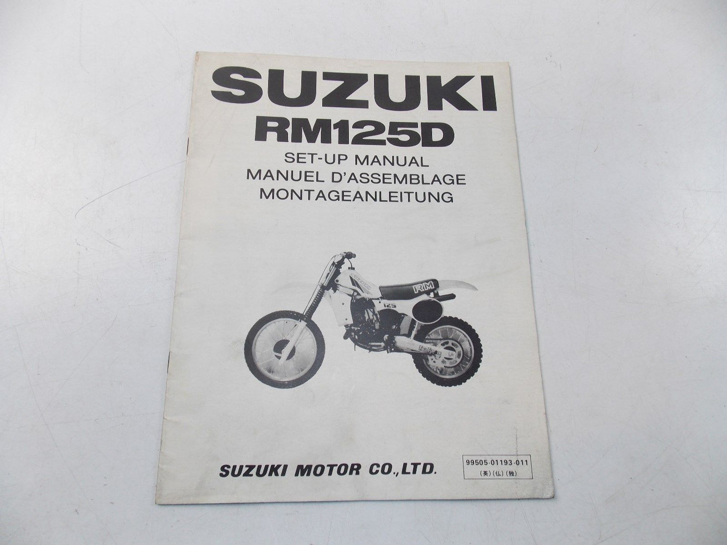 NEW SUZUKI 1982 SETUP MANUAL RM125D ENGLISH FRENCH GERMAN 99505-01193-011 - MotoRaider