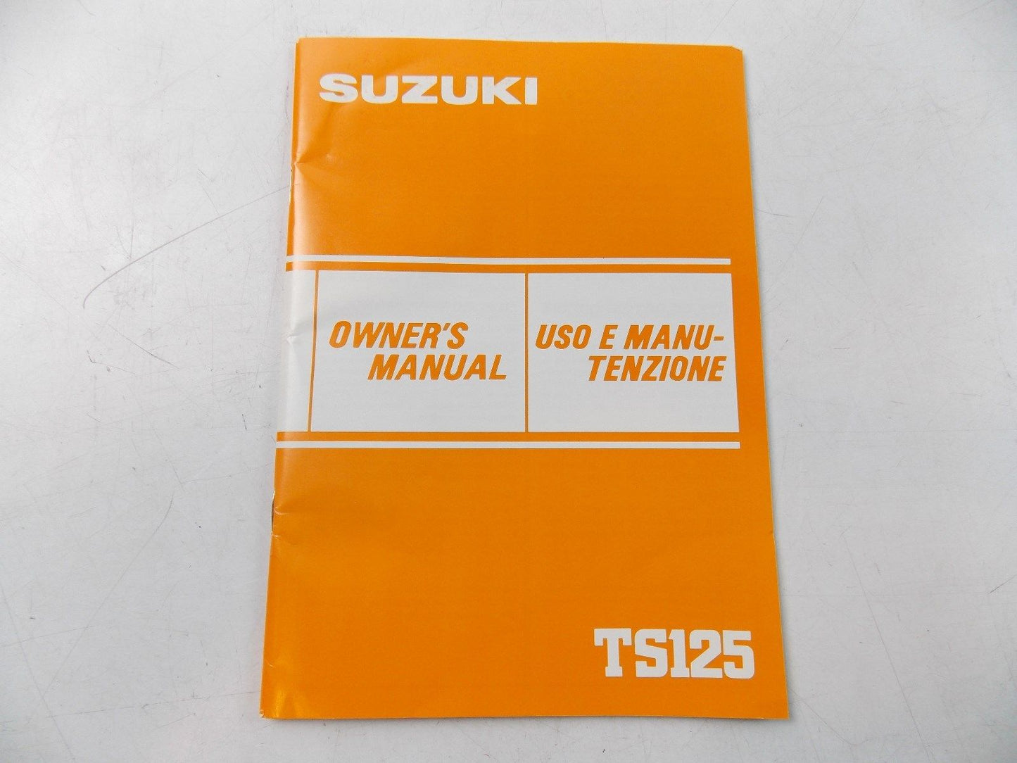 NEW SUZUKI 1983 OWNER'S MANUAL BOOK TS125 ENGLISH ITALIAN 99011-48021-026 - MotoRaider