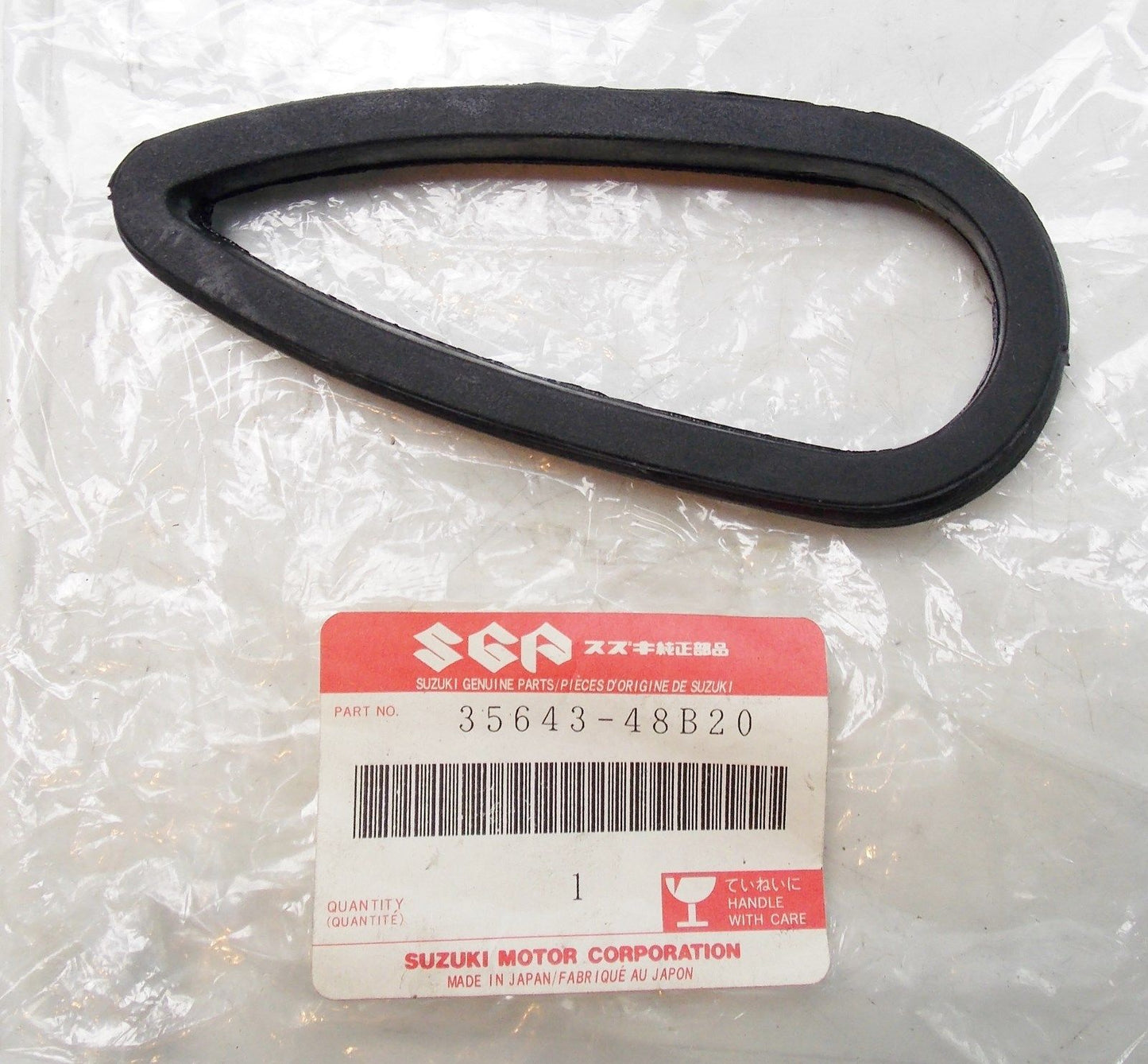 NOS SUZUKI 1988-1993 TURN SIGNAL LAMP GASKET GSX1100 35643-48B20 - MotoRaider