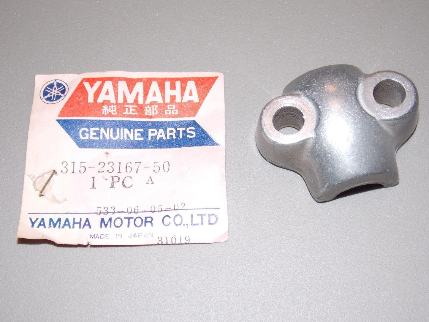 NOS YAMAHA 1972-1977 AXLE HOLDER DT125/175 MX175 YZ125 TY250 CT2 315-23167-50 - MotoRaider
