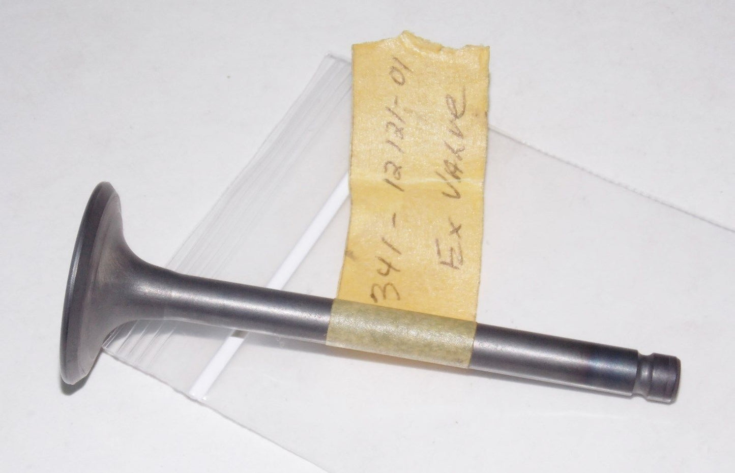 NOS OEM YAMAHA 1970-1983 EXHAUST VALVE XS1/650/TX650/750 341-12121-01 - MotoRaider
