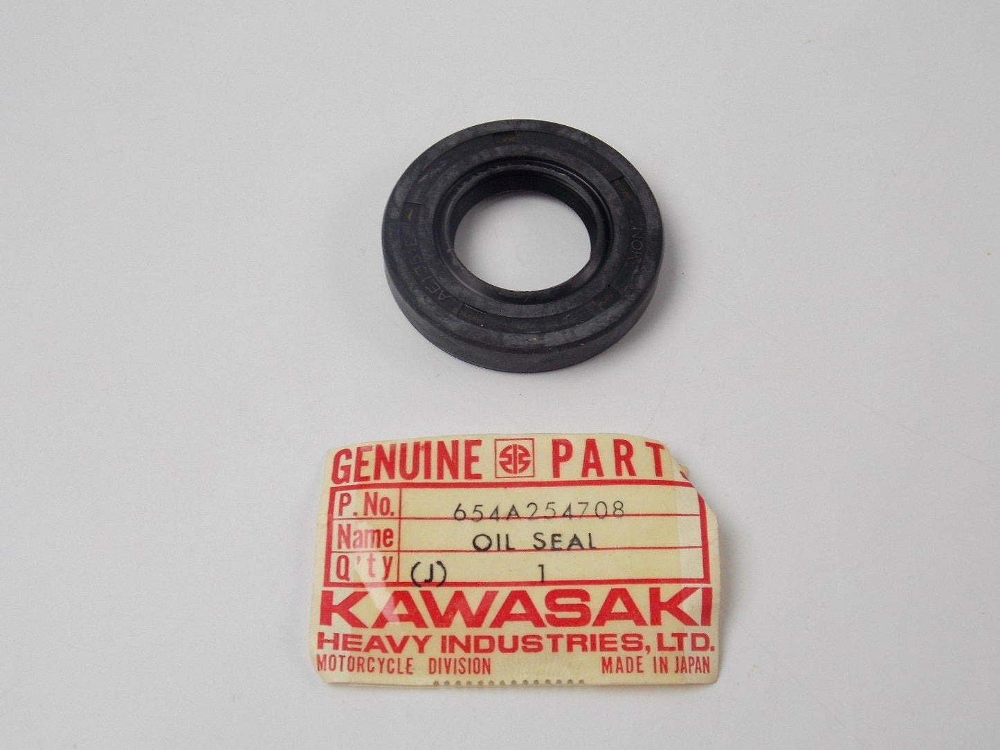 NOS OEM KAWASAKI 1966-1981 FRONT AXLE OIL SEAL F5/8/9 W1/2 H1 KH500 654A254708 - MotoRaider