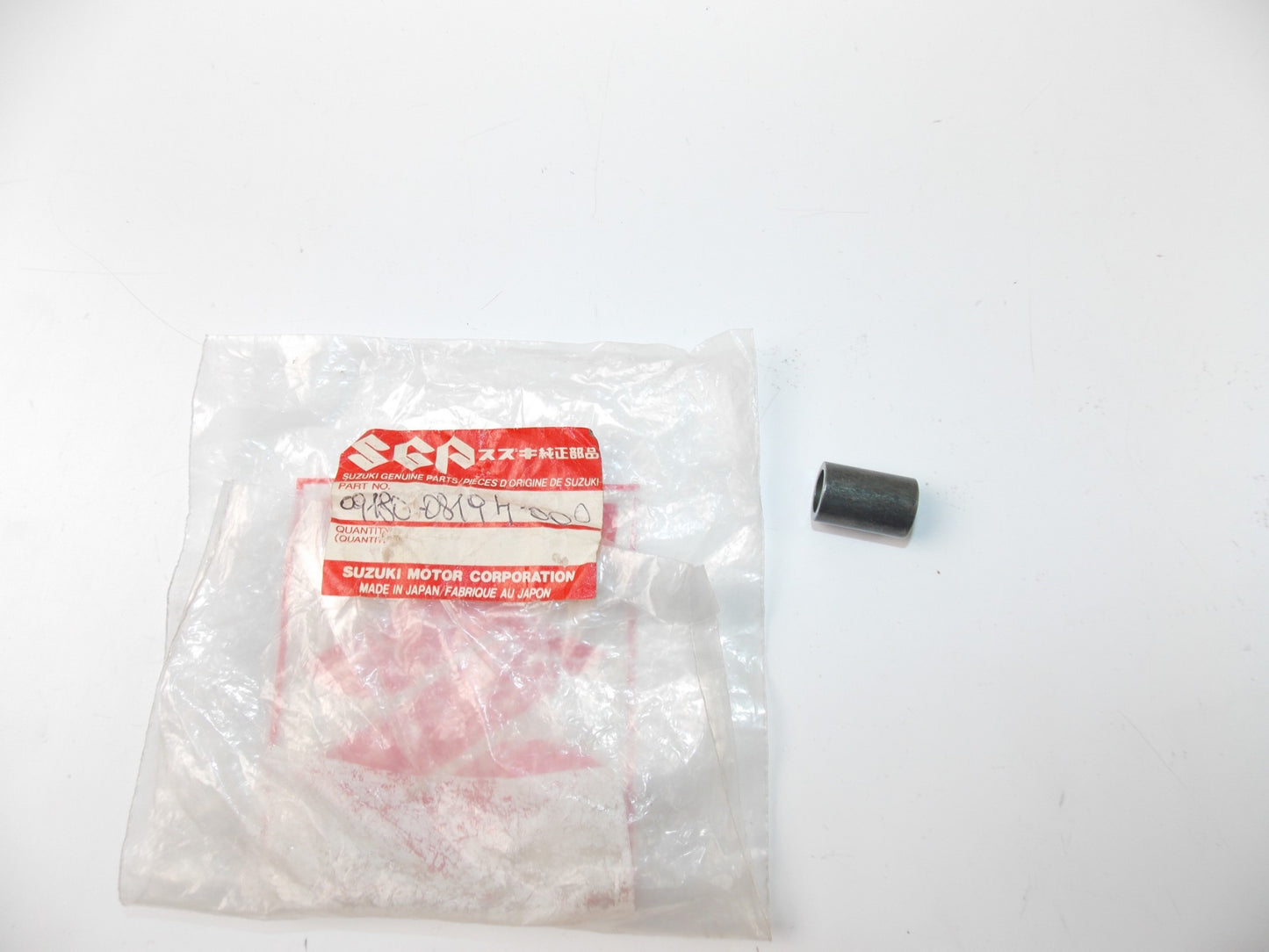 NOS OEM 1981-2018 SUZUKI LT80/250/300/125/185  ALT50/125 SPACER  09180-08194 - MotoRaider