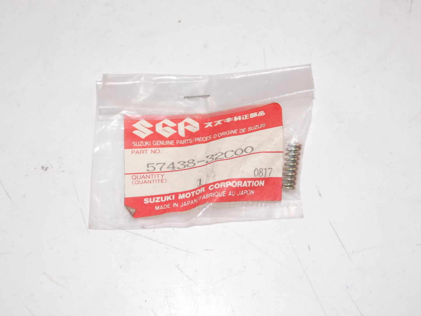 NOS OEM 1988-1993 SUZUKI HANDLE SWITCH SPRING VX800 GS500 GSF400 57438-32C00 - MotoRaider
