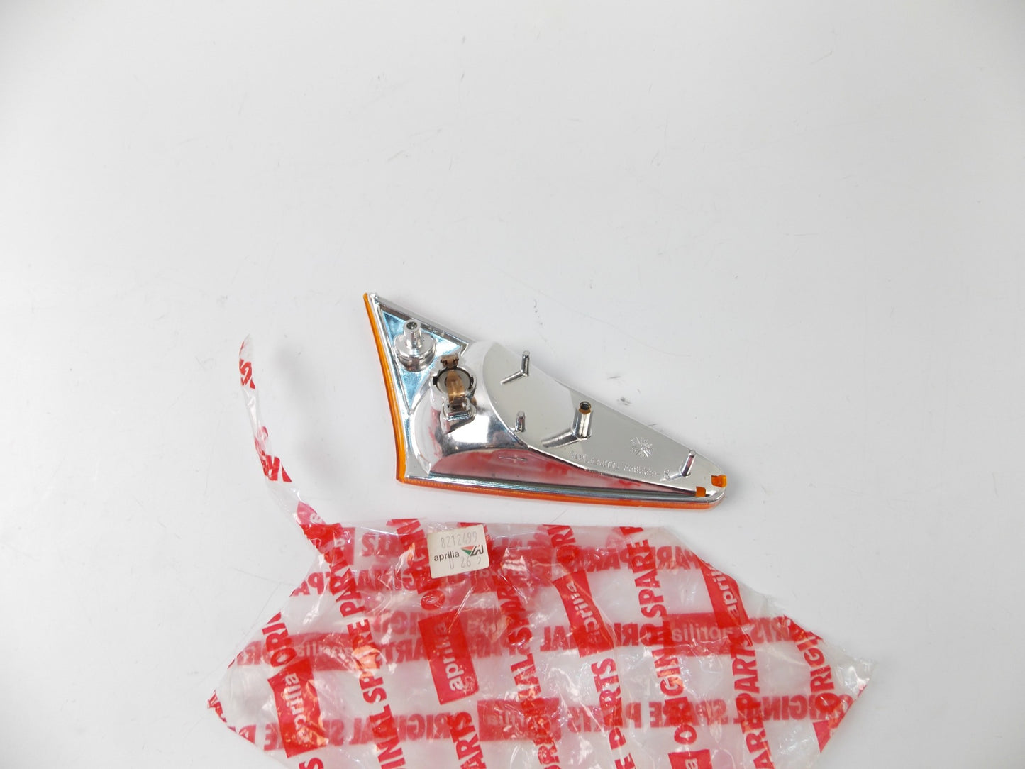 NOS APRILIA SR 50 1993-1996 TURN SIGNAL BLINKER INDICATOR 8212499 - MotoRaider