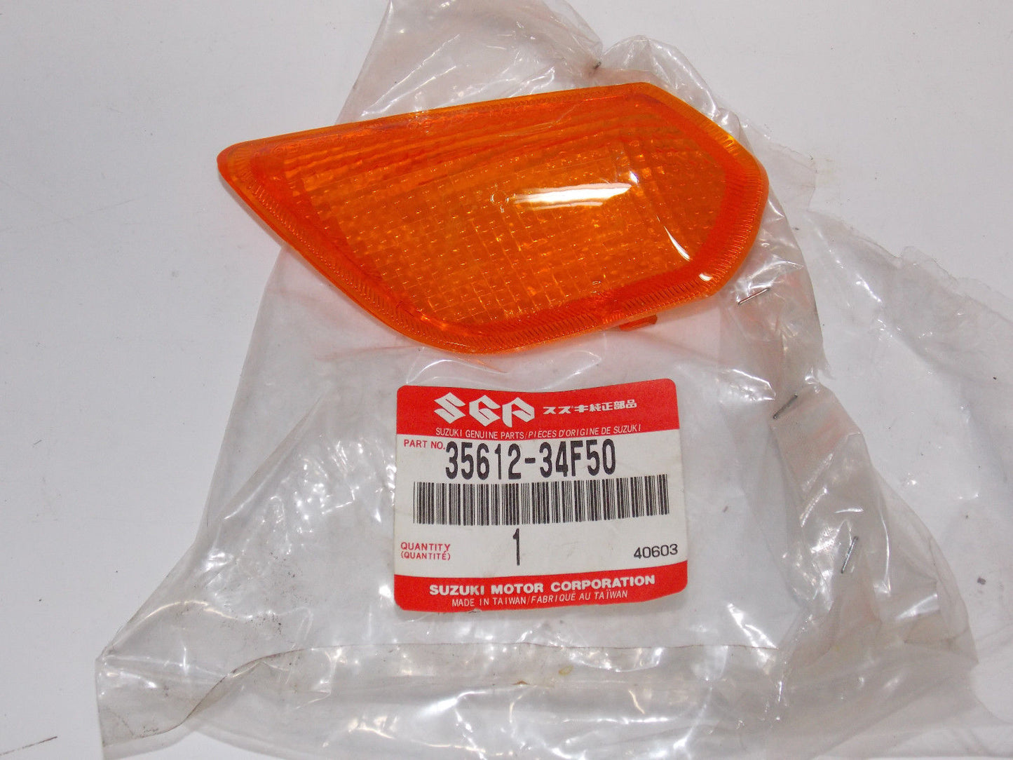 OEM NEW SUZUKI SCOOTER 2001 UE125 FRONT TURN SIGNAL INDICATOR LENS 35612-34F50 - MotoRaider