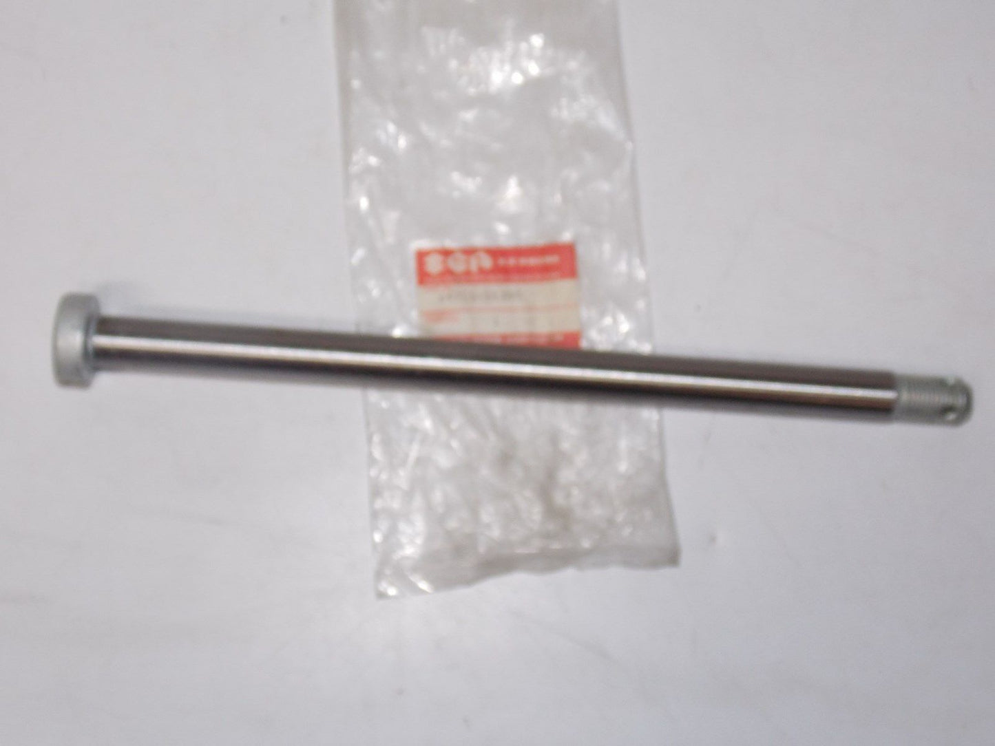 OEM NOS SUZUKI 1983 1985 REAR AXLE WHEEL GS750E ES 64711-31300 - MotoRaider