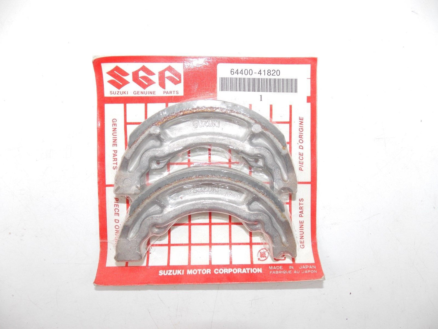 NOS SUZUKI 1999 REAR SHOE SET BRAKE AZ50 TR50 AG100 64400-41820 - MotoRaider