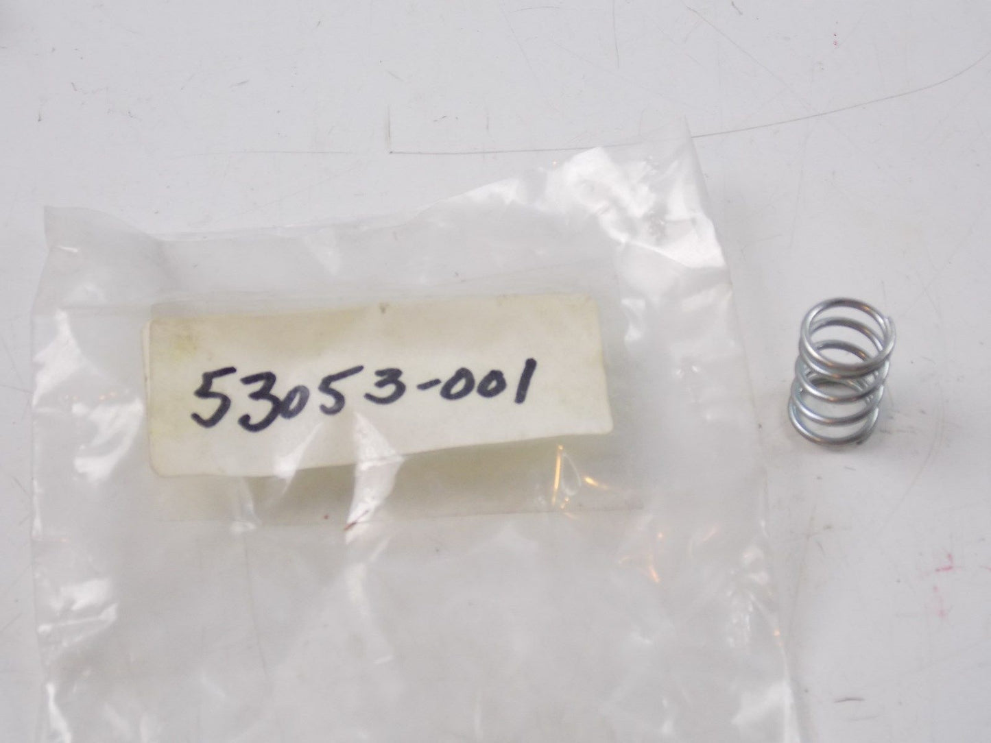 NOS KAWASAKI 1973 1974 1975 SEAT LOCK SPRING Z1 53053-001 - MotoRaider