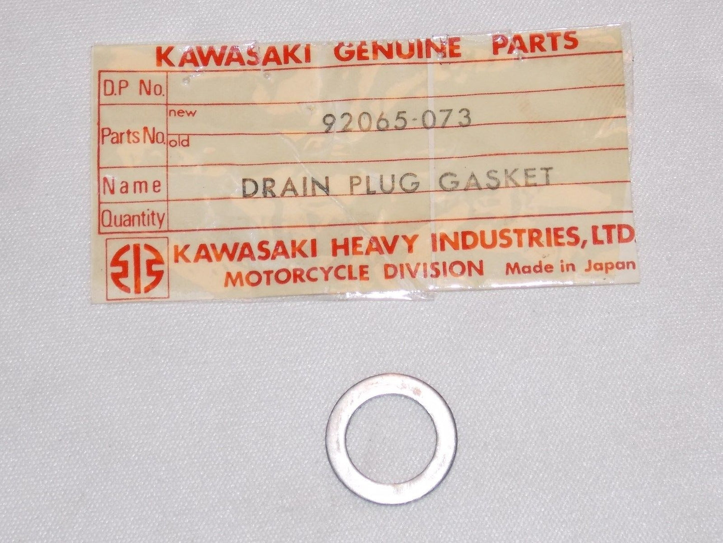 NOS KAWASAKI 1971-2015 OIL DRAIN PLUG GASKET KLX650 KS125 KXT250 92065-073 - MotoRaider
