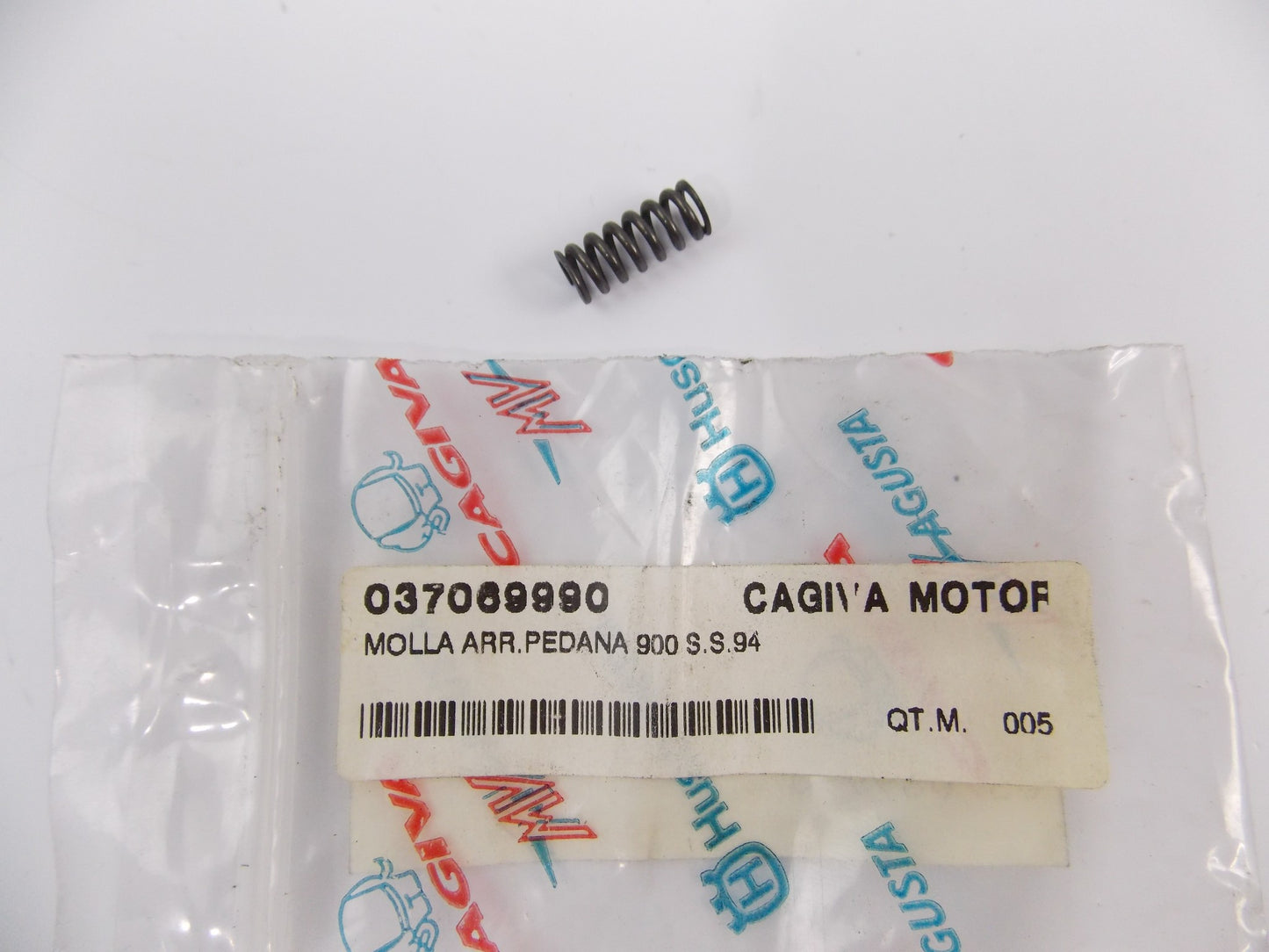 NOS OEM 1984-94 DUCATI 900-SS 750-PASO 750-SPORT REAR FOOTBOARD SPRING 037069990 - MotoRaider