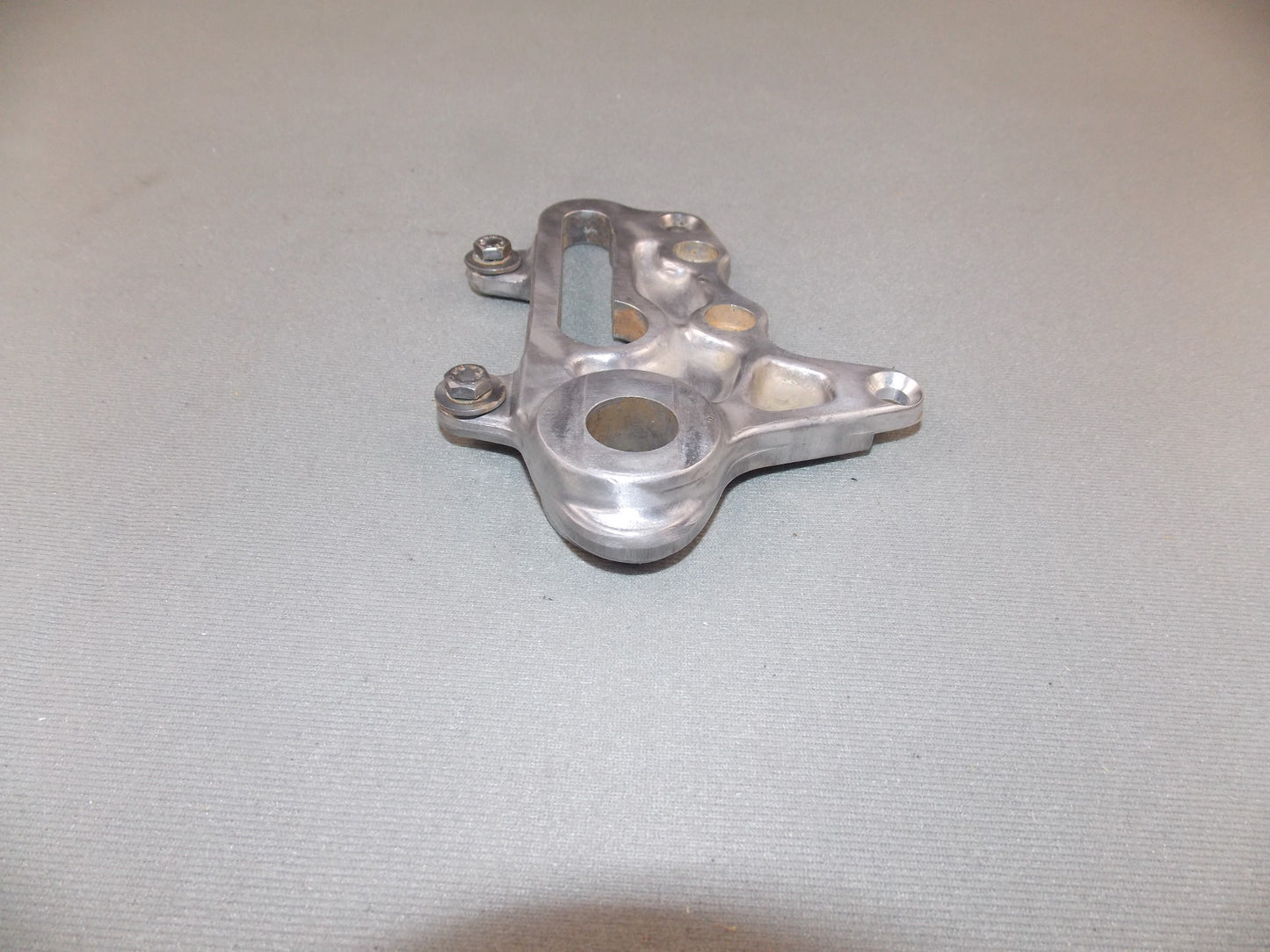 1992 KTM MXC 250 REAR WHEEL SPACER BRACKET BRAKE CALIPER HOLDER SUPPORT - MotoRaider