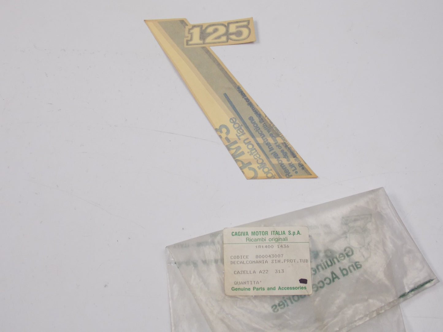 NOS OEM CAGIVA ALETTA ROSSA 125 RED LEFT GUARD STICKER "125" 800043007 - MotoRaider