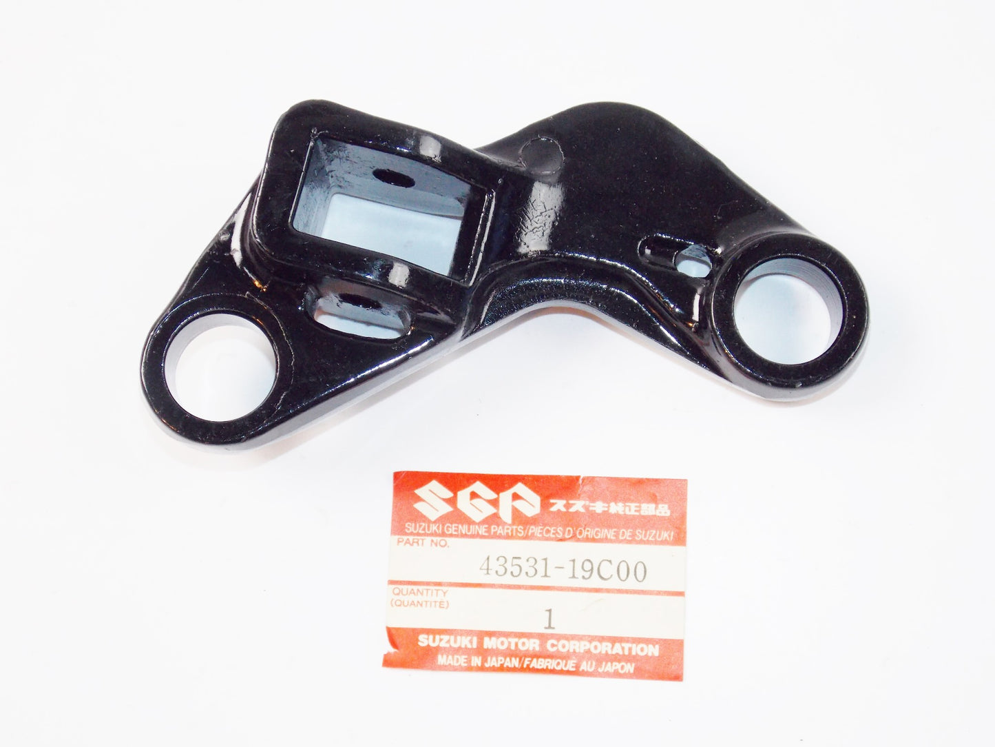 NOS OEM SUZUKI 88-06 GSX600F/FT/FV RH FRONT FOOTREST HOLDER 43531-19C00 - MotoRaider