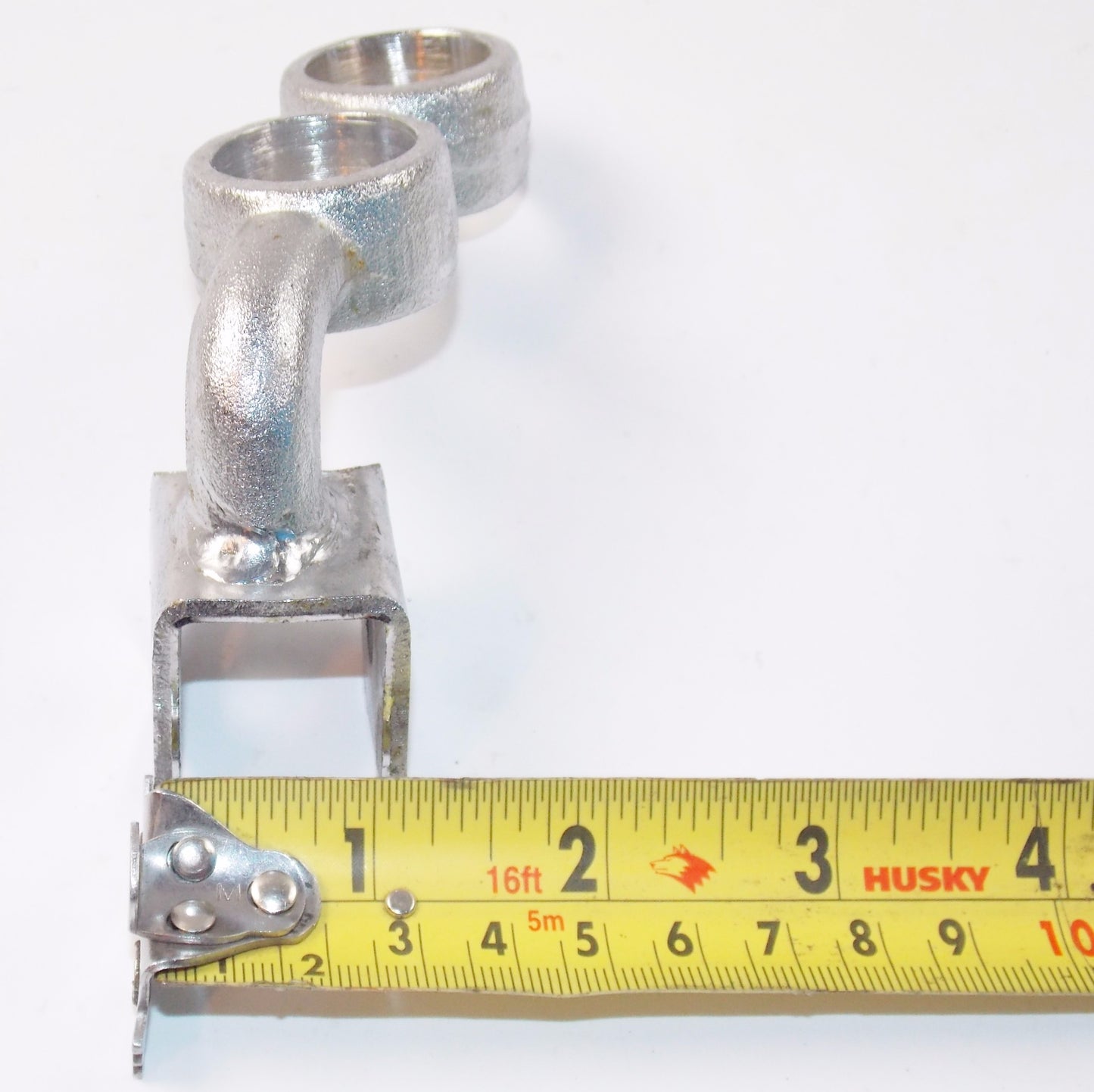 NOS OEM SUZUKI CRHOME RH FRONT FOOTREST BRACKET - MotoRaider