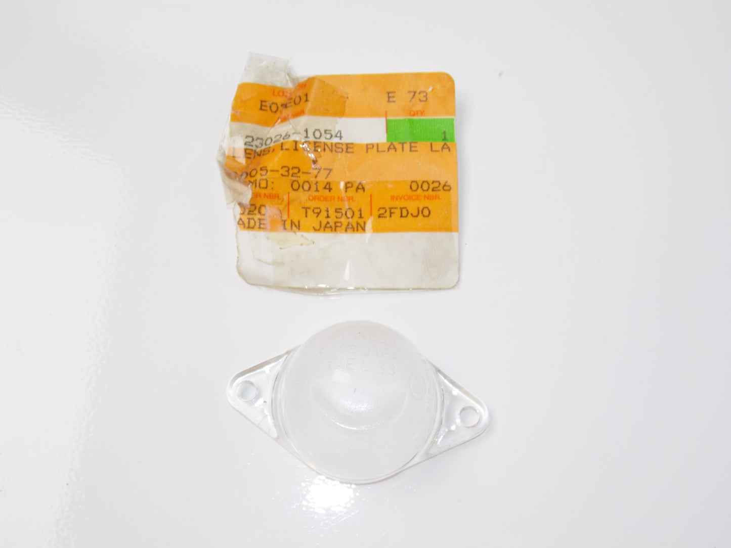 NOS OEM KAWASAKI 84-15 KL600 ZX900 ZG1000 Vulcan LENS LICNSE PLATE LA 23026-1054 - MotoRaider