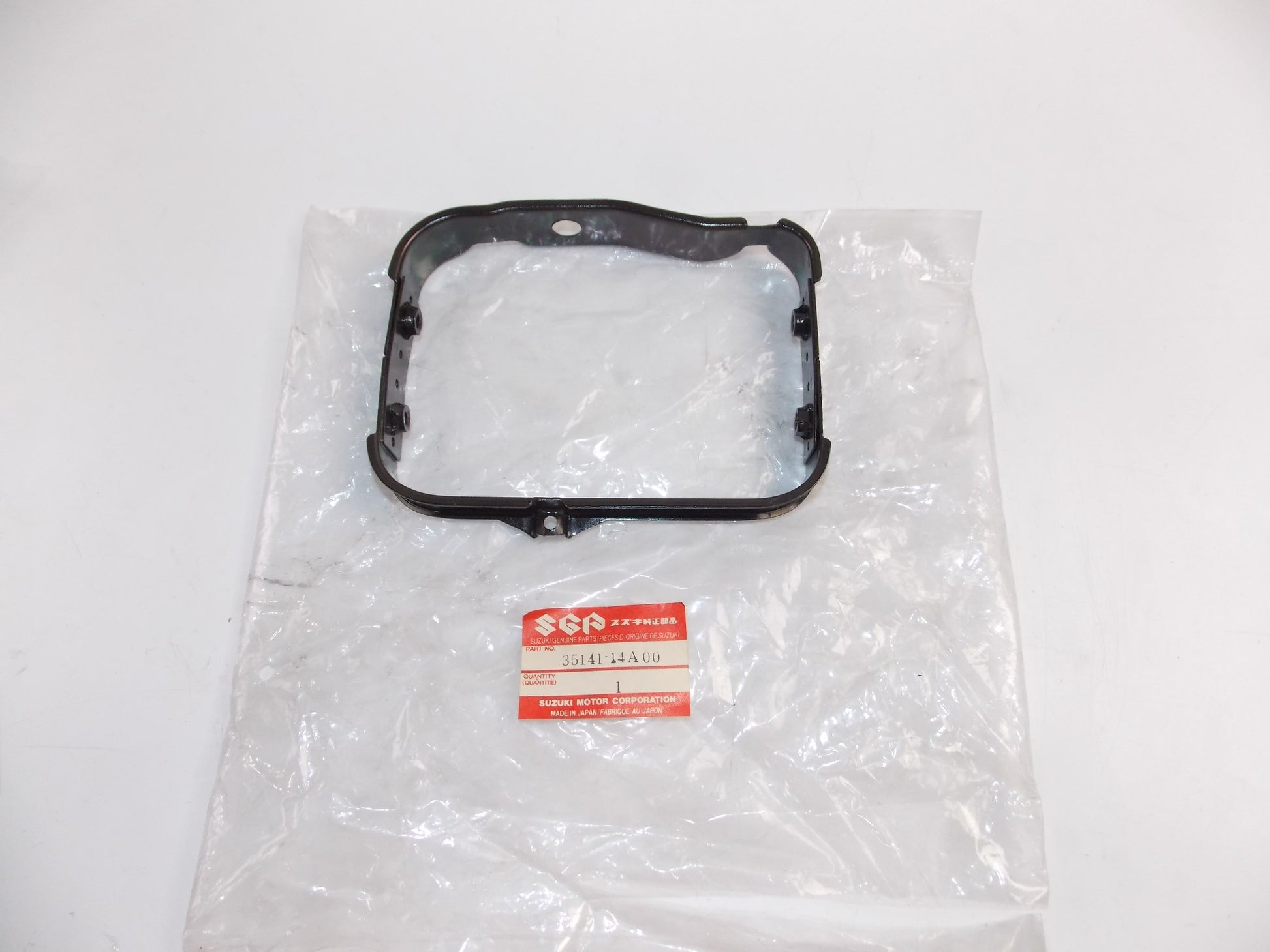 NOS OEM 1985-2009 2013 SUZUKI HEADLAMP HOUSING DR200/350/125/250  35141-14A00 - MotoRaider