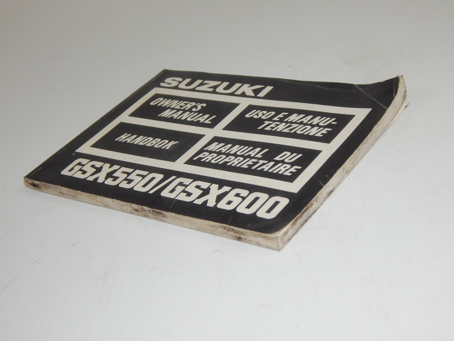 1986 SUZUKI GSX500 GSX600 USER OWNER MANUAL BOOK 99011-43424-027 MULTI LANGUAGE - MotoRaider