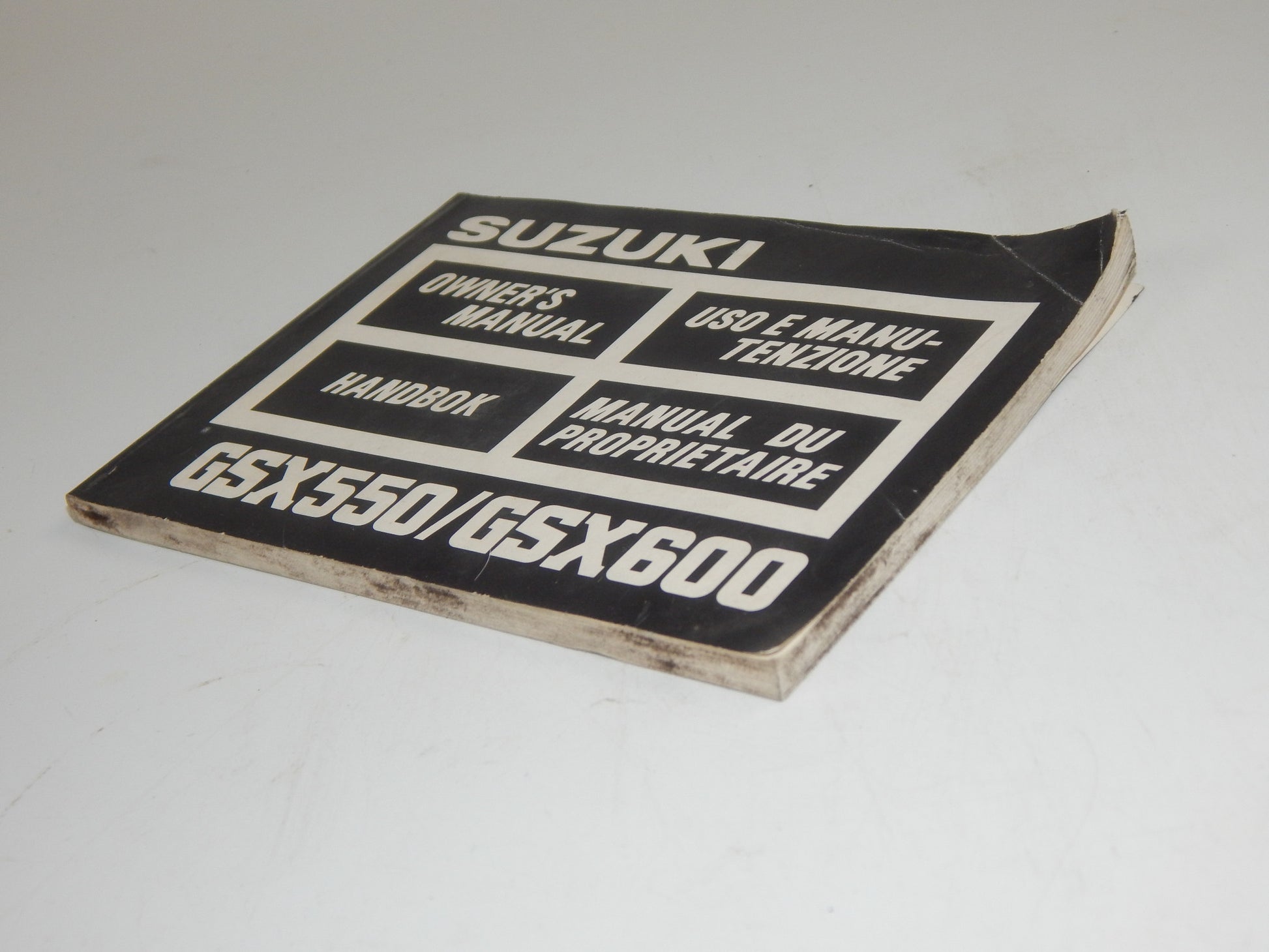 1986 SUZUKI GSX500 GSX600 USER OWNER MANUAL BOOK 99011-43424-027 MULTI LANGUAGE - MotoRaider