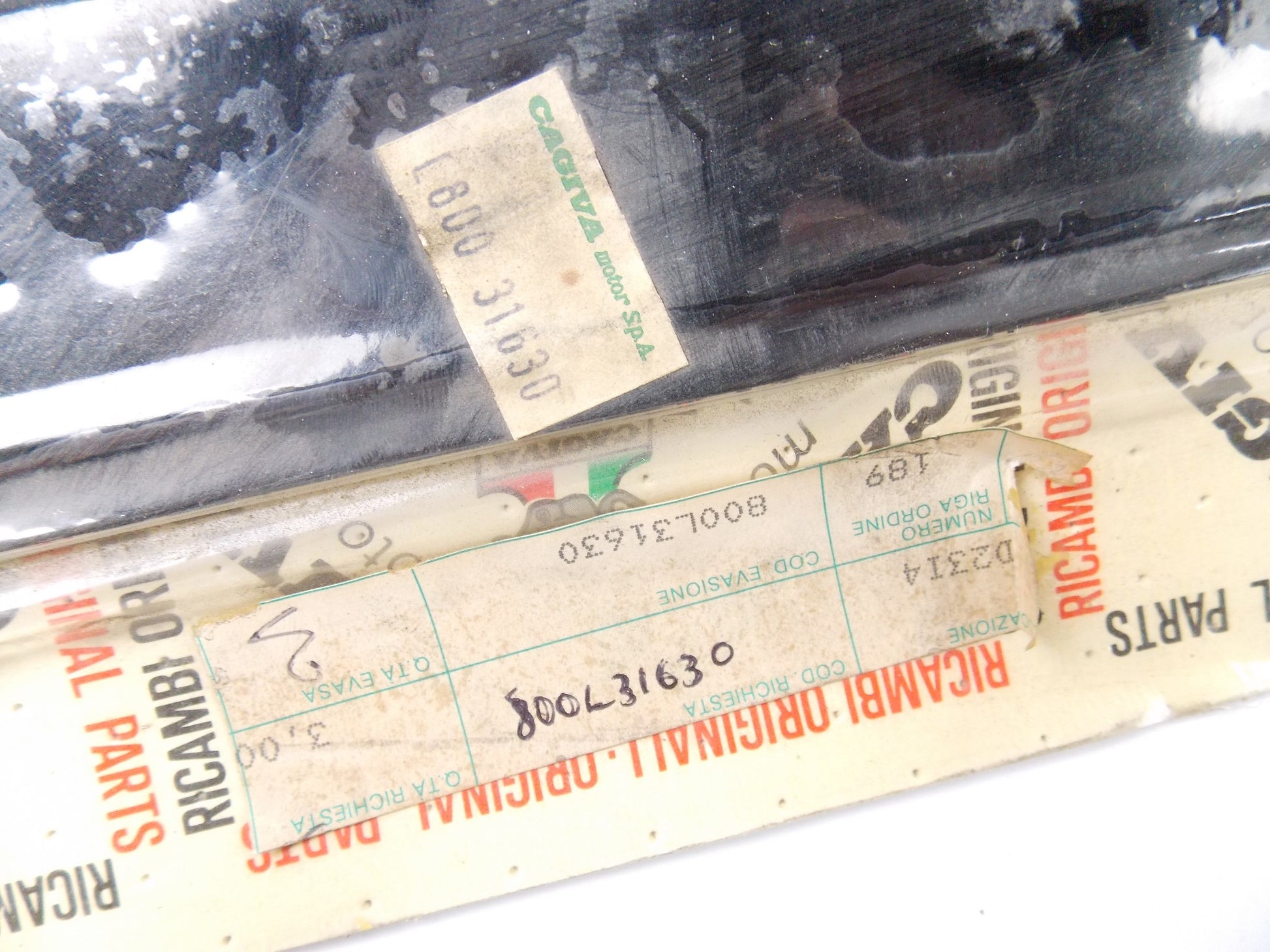 NOS OEM 1981 CAGIVA SST 125 CHAIN GUARD PROTECTOR BLACK 800L31630 | L80031630 - MotoRaider