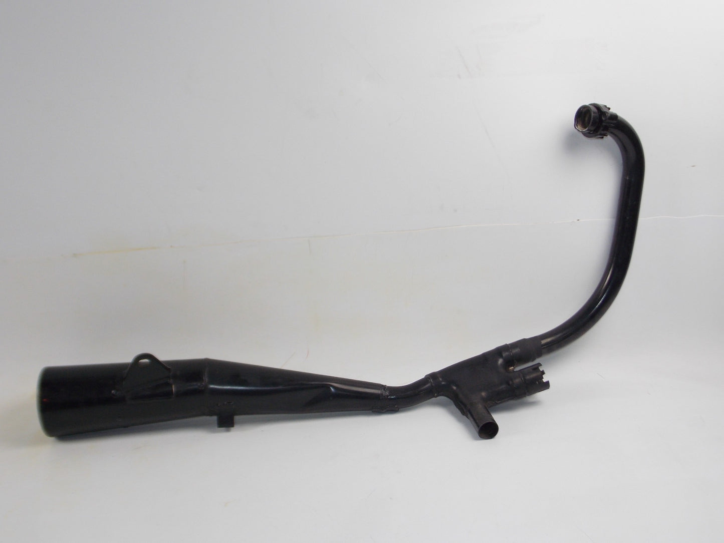NOS OEM SUZUKI 1984-1987 GSX500E LEFT HAND EXHAUST MUFFLER PIPE # 14306-43402 - MotoRaider