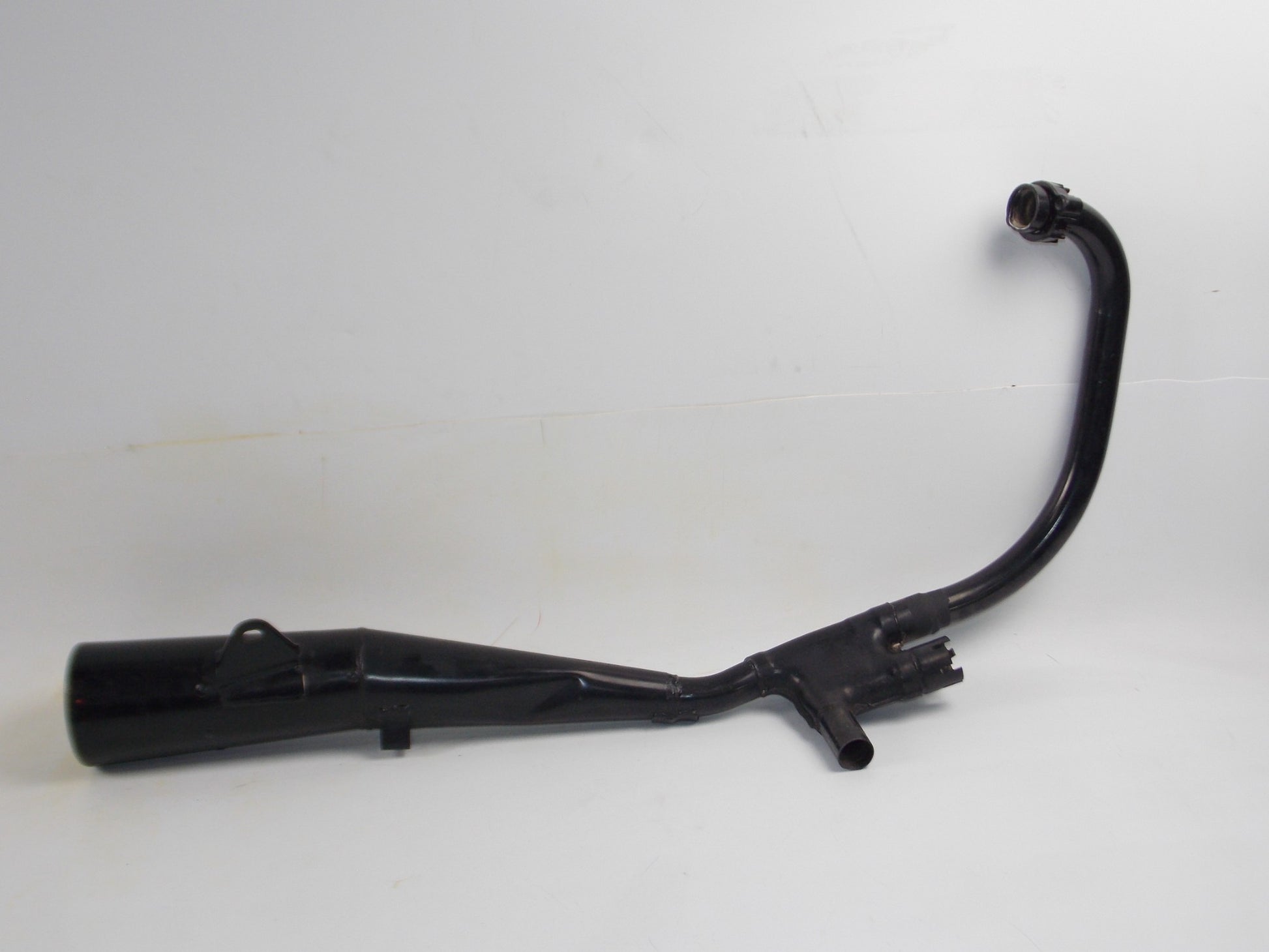 NOS OEM SUZUKI 1984-1987 GSX500E LEFT HAND EXHAUST MUFFLER PIPE # 14306-43402 - MotoRaider