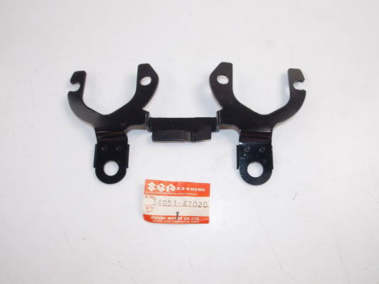 NOS 1977-1981 SUZUKI GS850/550 SPEEDOMETER TACHOMETER BRACKET MOUNT 34951-47020 - MotoRaider