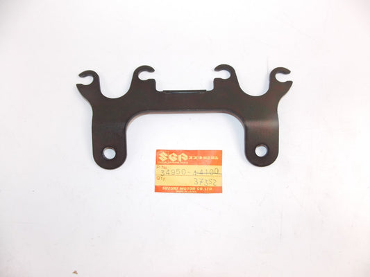 NOS 1980-82 SUZUKI GS250/450 SPEEDOMETER TACHOMETER BRACKET MOUNT 34950-37352 - MotoRaider