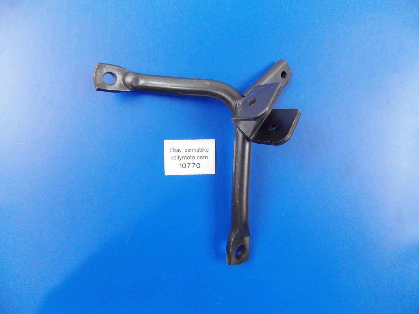 OEM HONDA 2003-2006 NES125 STAY COMP LEFT STEP 50716-KPZ-900 | 50716KPZ900 - MotoRaider