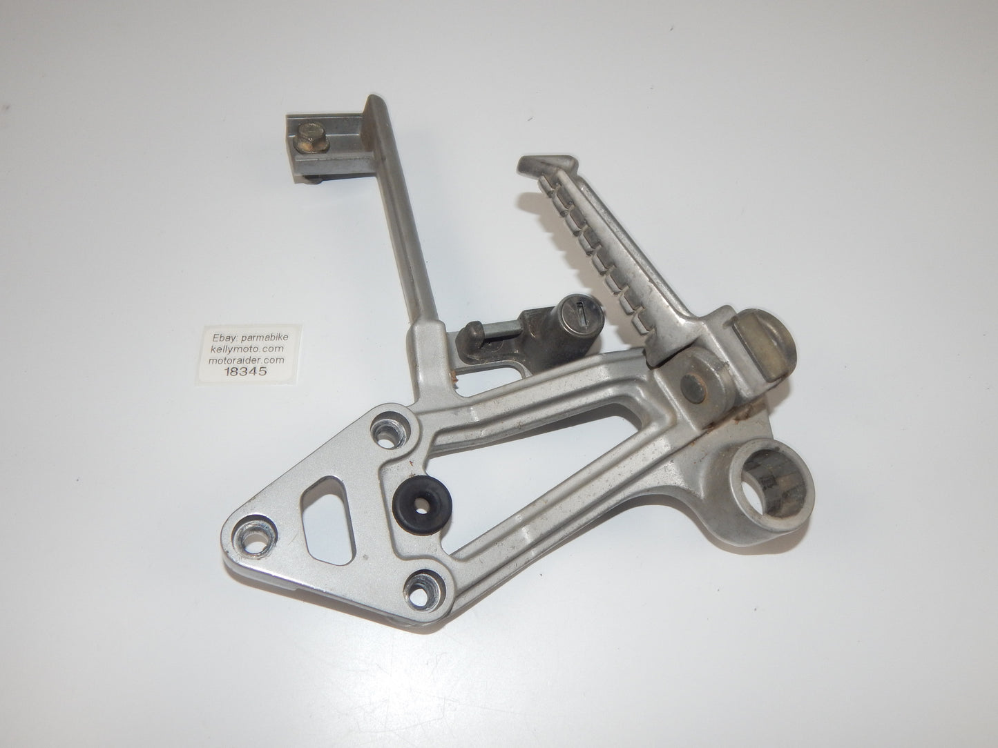 1986 KAWASAKI GPX 750-R REAR LEFT PASSENGER FOOT PEG STAY STAND BRACKET VINTAGE - MotoRaider