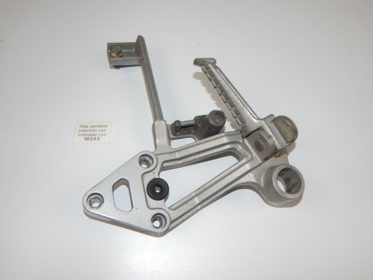 1986 KAWASAKI GPX 750-R REAR LEFT PASSENGER FOOT PEG STAY STAND BRACKET VINTAGE - MotoRaider