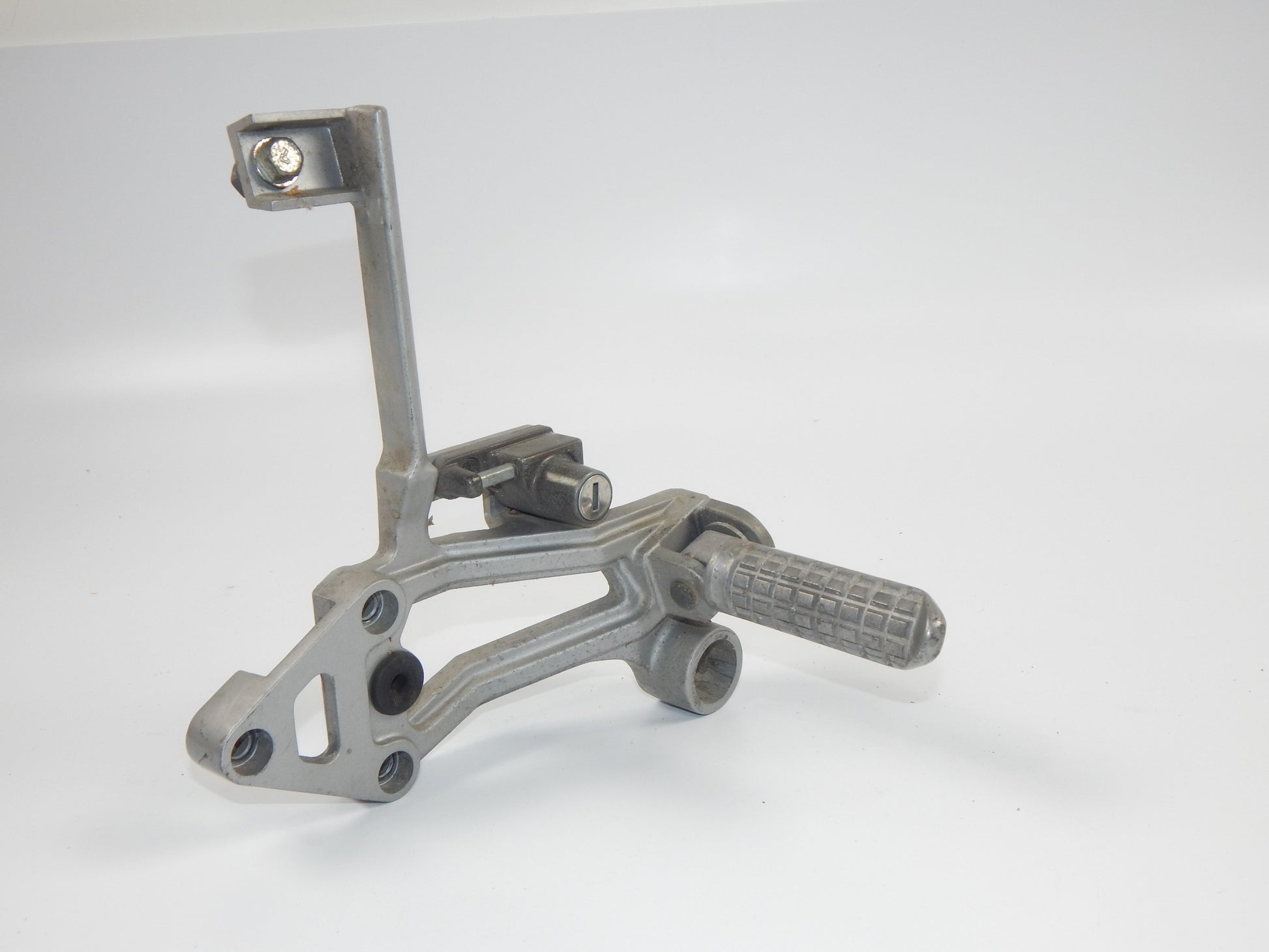 1986 KAWASAKI GPX 750-R REAR LEFT PASSENGER FOOT PEG STAY STAND BRACKET VINTAGE - MotoRaider