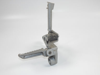 1986 KAWASAKI GPX 750-R REAR LEFT PASSENGER FOOT PEG STAY STAND BRACKET VINTAGE - MotoRaider