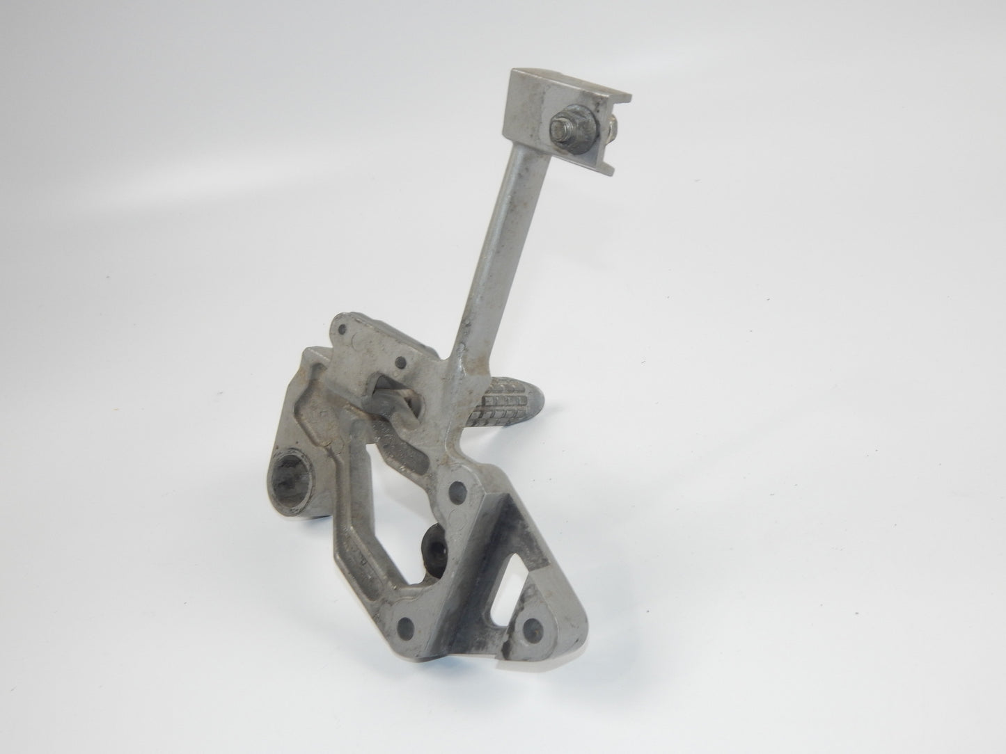1986 KAWASAKI GPX 750-R REAR LEFT PASSENGER FOOT PEG STAY STAND BRACKET VINTAGE - MotoRaider