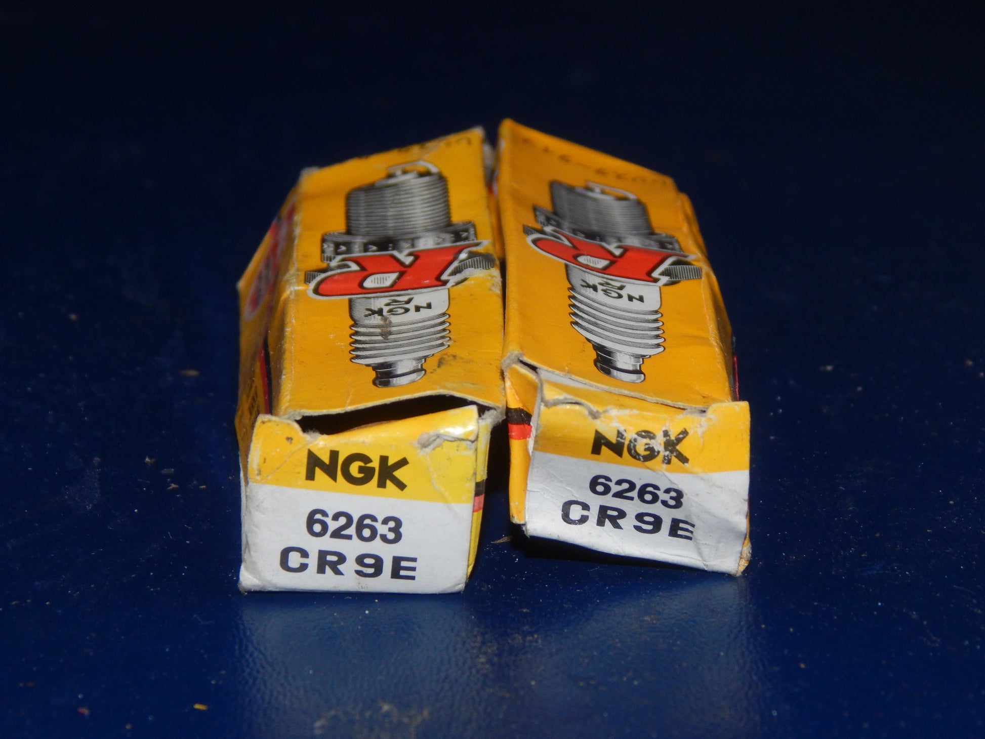 59 NEW MIXED SPARK PLUG MOTORCYCLE SCOOTER ATV NGK BOSCH CHAMPION ND DENSO - MotoRaider
