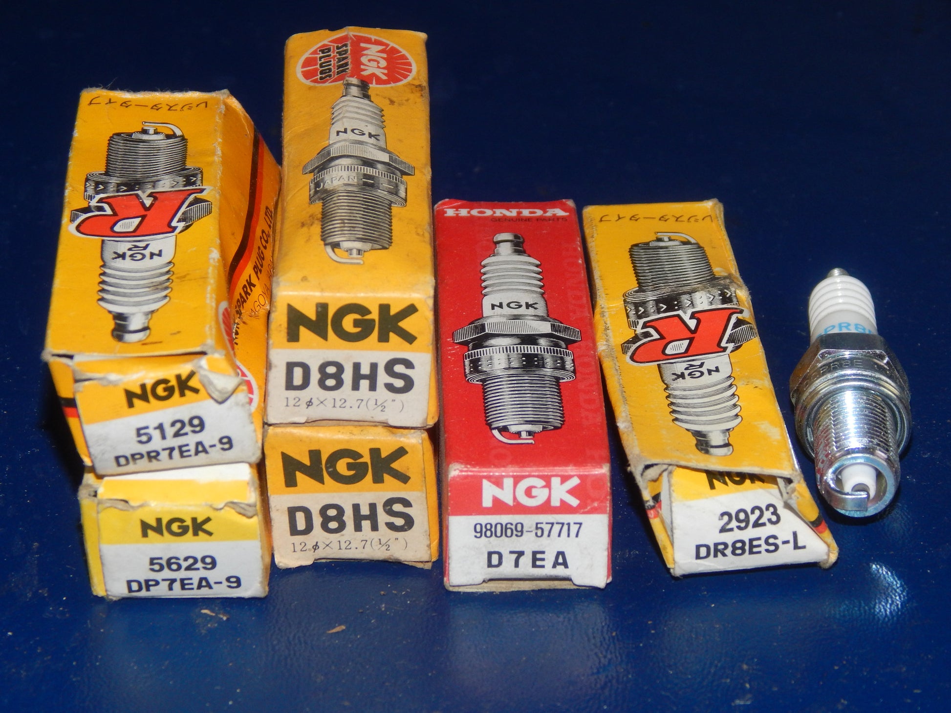 59 NEW MIXED SPARK PLUG MOTORCYCLE SCOOTER ATV NGK BOSCH CHAMPION ND DENSO - MotoRaider