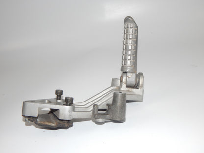 1986 KAWASAKI GPX 750-R REAR RIGHT PASSENGER FOOT PEG STAY STAND BRACKET VINTAGE - MotoRaider
