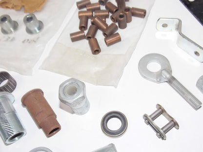 NOS Puch Allstate MIXED PARTS Spacer Bearing Nut Axle Adjustor Plate Mount Clip - MotoRaider