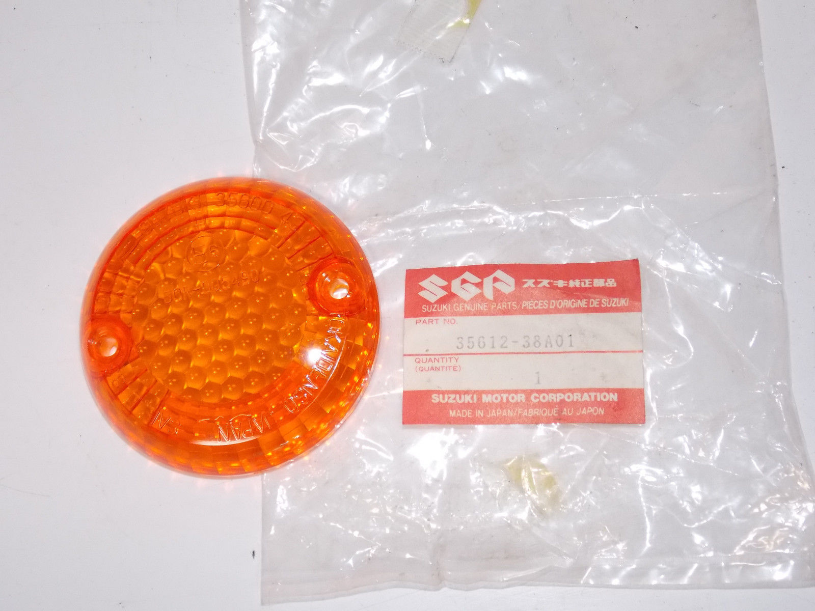 OEM NEW SUZUKI 1986 2011 LS650 VS1400 GSF400 GZ250 TURN SIGNAL LENS 35612-38A01 - MotoRaider
