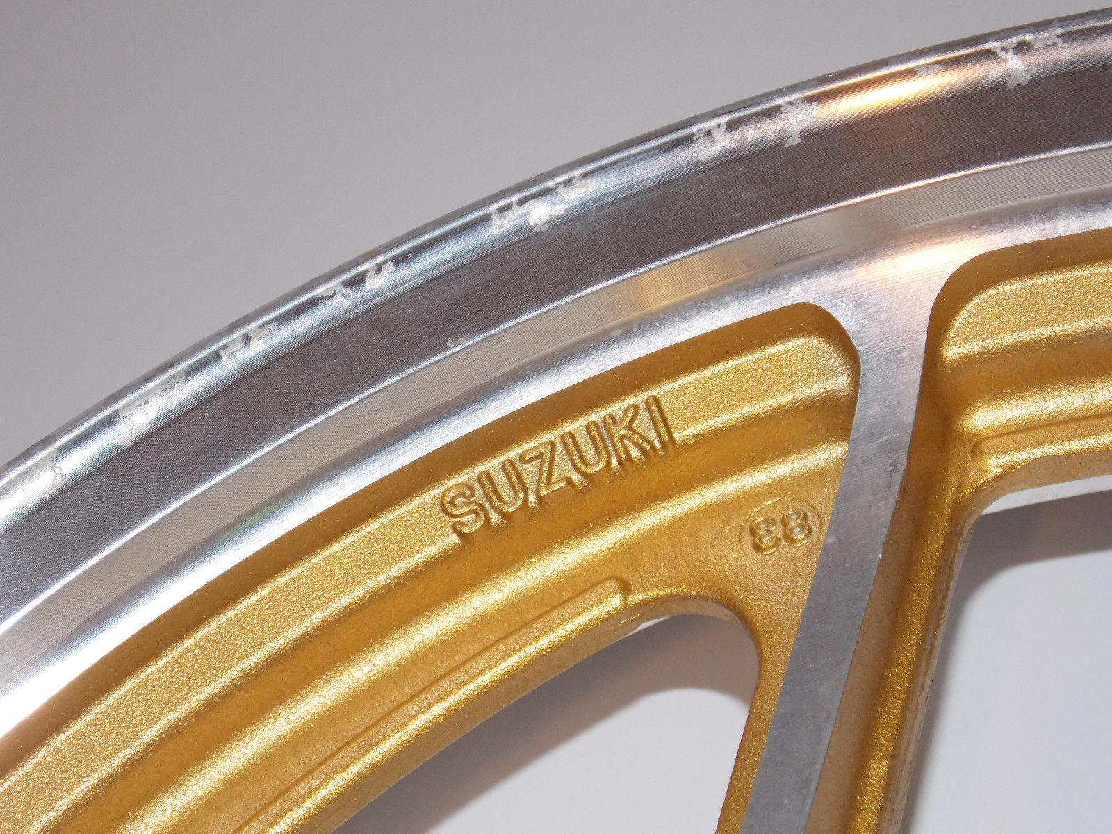 NOS SUZUKI 1983-84-85 GSX750 1.6-2.15 ASAHI ALLOY GOLD RIM WHEEL 54111-09310-19T - MotoRaider