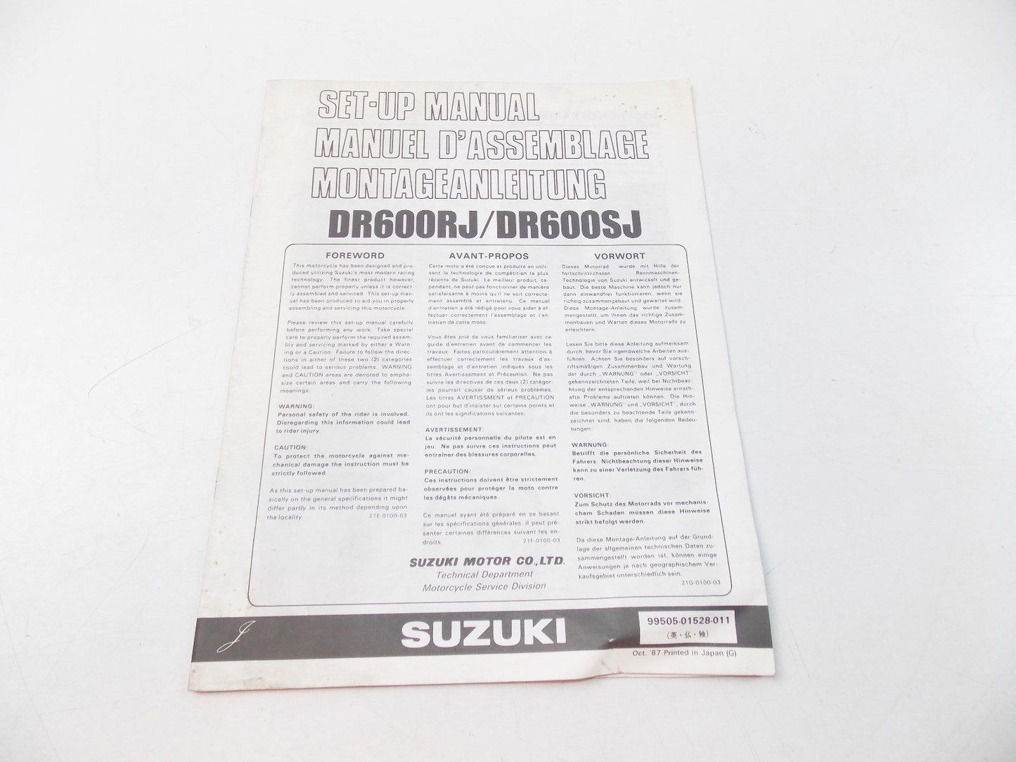 NEW SUZUKI 1987 SET-UP MANUAL DR600 ENGLISH FRENCH GERMAN   99505-01528-011 - MotoRaider