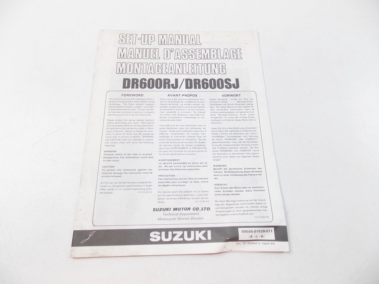 NEW SUZUKI 1987 SET-UP MANUAL DR600 ENGLISH FRENCH GERMAN   99505-01528-011 - MotoRaider