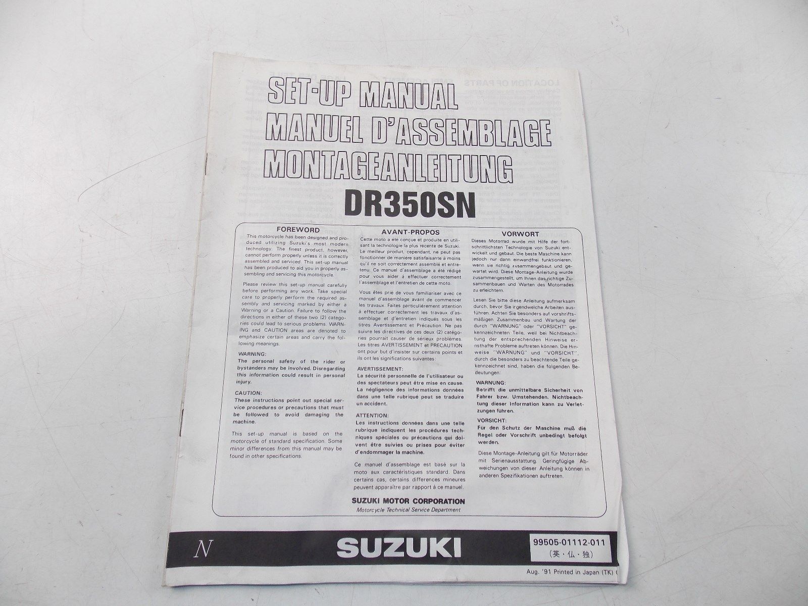 NEW SUZUKI 1991 SETUP MANUAL DR350SN ENGLISH FRENCH GERMAN  99505-01112-011 - MotoRaider